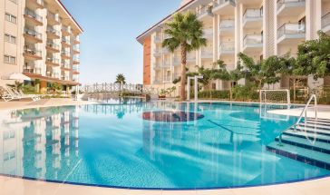 RAMADA HOTEL & SUITES BY WYNDHAM